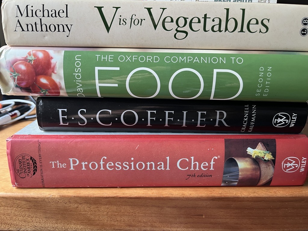 image of culinary text books from CIA, Escoffier, Alan Davidson